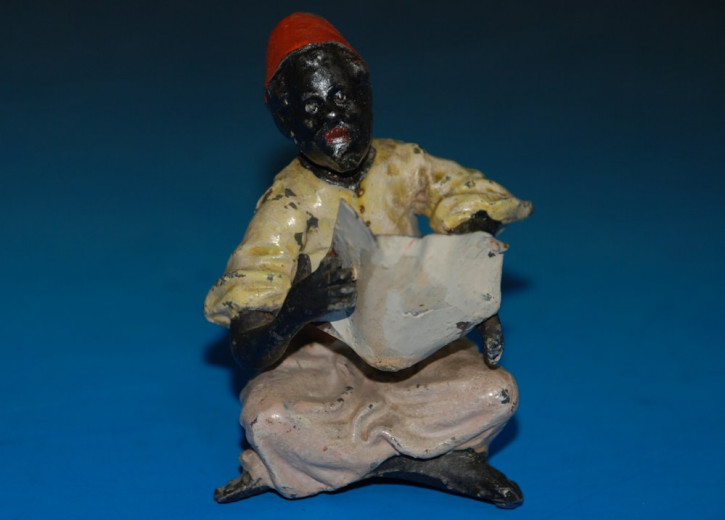 antique Heyde tin figure with shaking head * big figure sitting