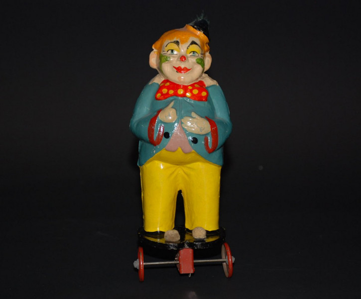 antique wheeled paper mache clown with flywheel drive * Thuringia 30s