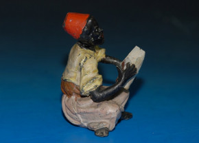 antique Heyde tin figure with shaking head * big figure sitting