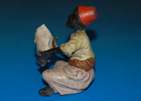 antique Heyde tin figure with shaking head * big figure sitting