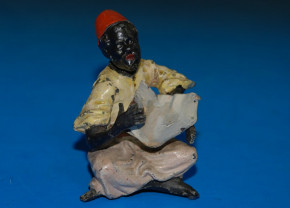 antique Heyde tin figure with shaking head * big figure sitting