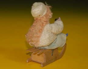 Porcelain head doll on sledges with winter clothing * Candybox * Thuringia around 1880-1890