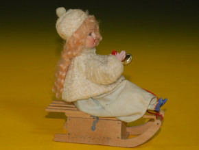 Porcelain head doll on sledges with winter clothing * Candybox * Thuringia around 1880-1890