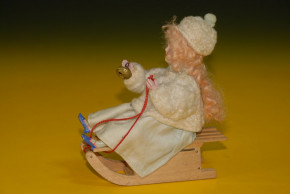 Porcelain head doll on sledges with winter clothing * Candybox * Thuringia around 1880-1890