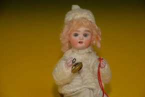 Porcelain head doll on sledges with winter clothing * Candybox * Thuringia around 1880-1890