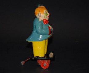 antique wheeled paper mache clown with flywheel drive * Thuringia 30s