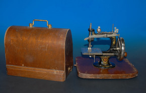 antique children sewing machine with wood hood * at 1900-1920