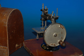 antique children sewing machine with wood hood * at 1900-1920