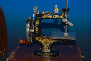 antique children sewing machine with wood hood * at 1900-1920